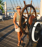 photo:  Paddy at the helm aboard the Moshulu