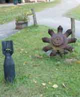 photo:  bomb and broken airplane engine
