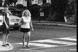 photo: pretty woman crossing the street